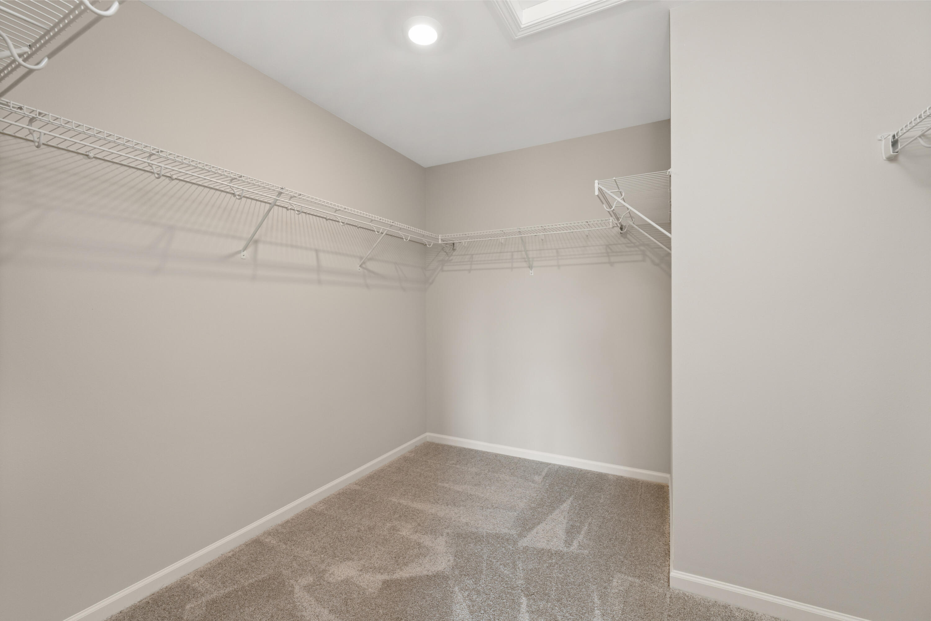 5567 Buttercup Avenue Portage, IN 46368 - Photo 13 of 17 a view of a room with racks on the wall