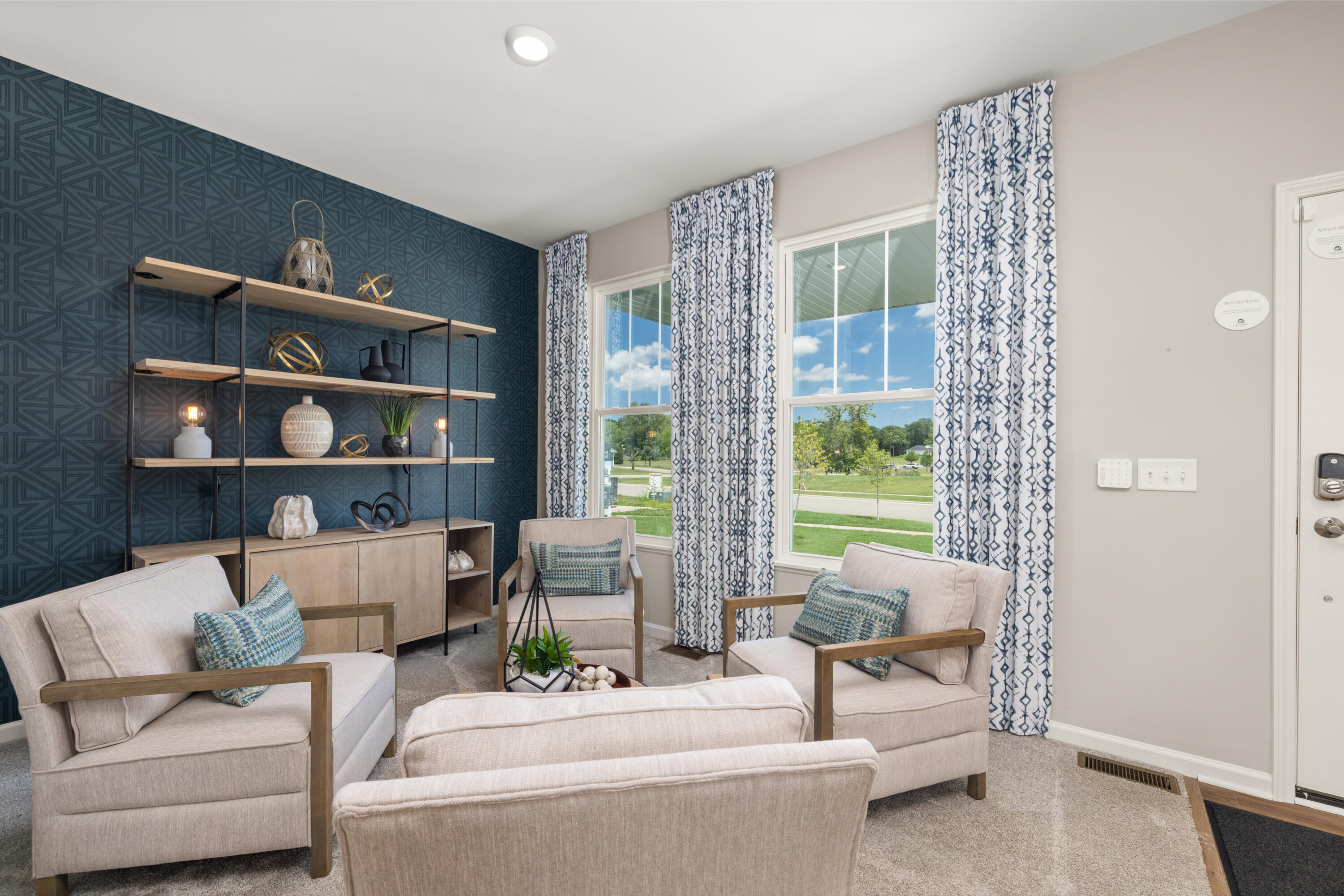 5567 Buttercup Avenue Portage, IN 46368 - Photo 3 of 17 a living room with furniture and a book shelf