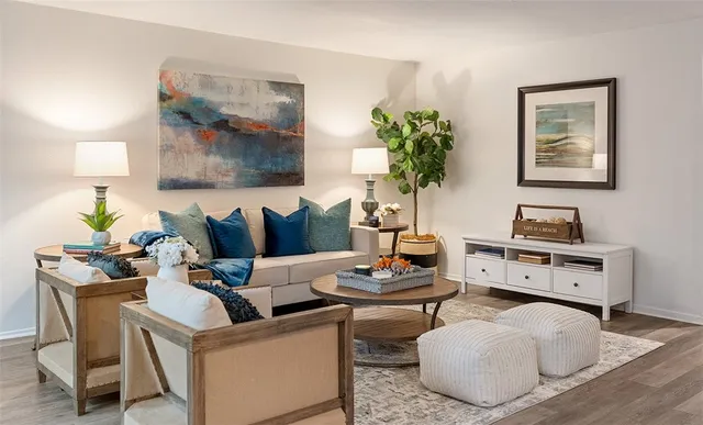 a view of a swimming pool with a lawn chairs under an umbrella