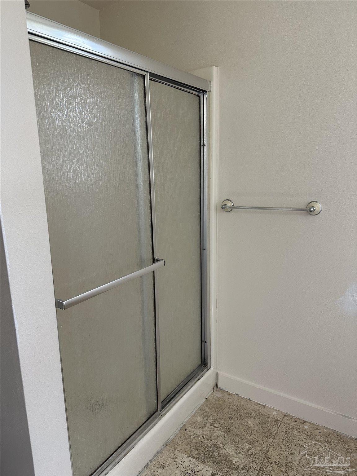 1052 Well Line Road Cantonment, FL 32533 - Photo 7 of 18 a view of closet area