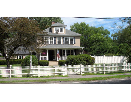 371 Weston Road Wellesley, MA 02481 - Photo 1 of 12 a front view of a house with a yard