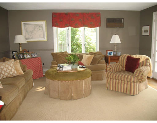371 Weston Road Wellesley, MA 02481 - Photo 6 of 12 a living room with furniture and a large window