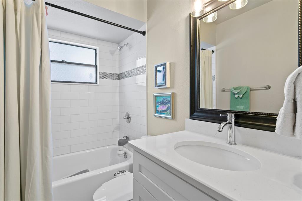 6712 Jennifer Drive Temple Terrace, FL 33617 - Photo 25 of 30 a bathroom with a sink and a bathtub