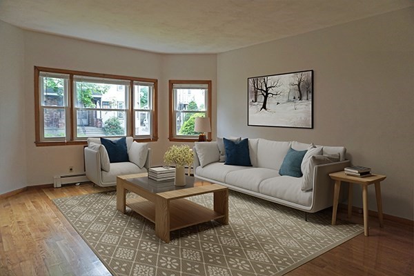 150 Brown Street, Unit 1L Waltham, MA 02453 - Photo 3 of 11 a living room with furniture and a window