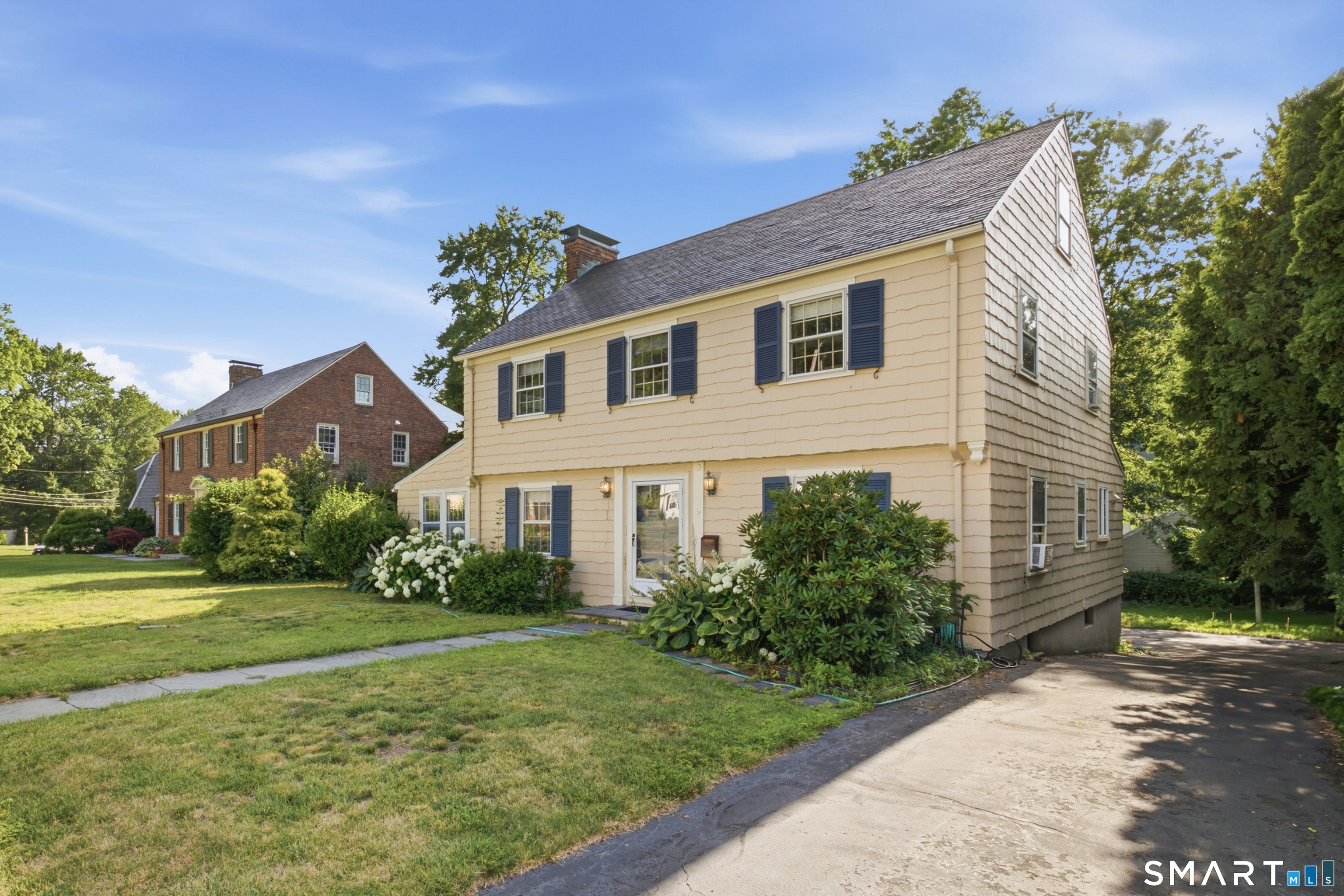 9 Stratford Road West Hartford, CT 06117 - Photo 2 of 40 A classic Colonial exterior with wood siding