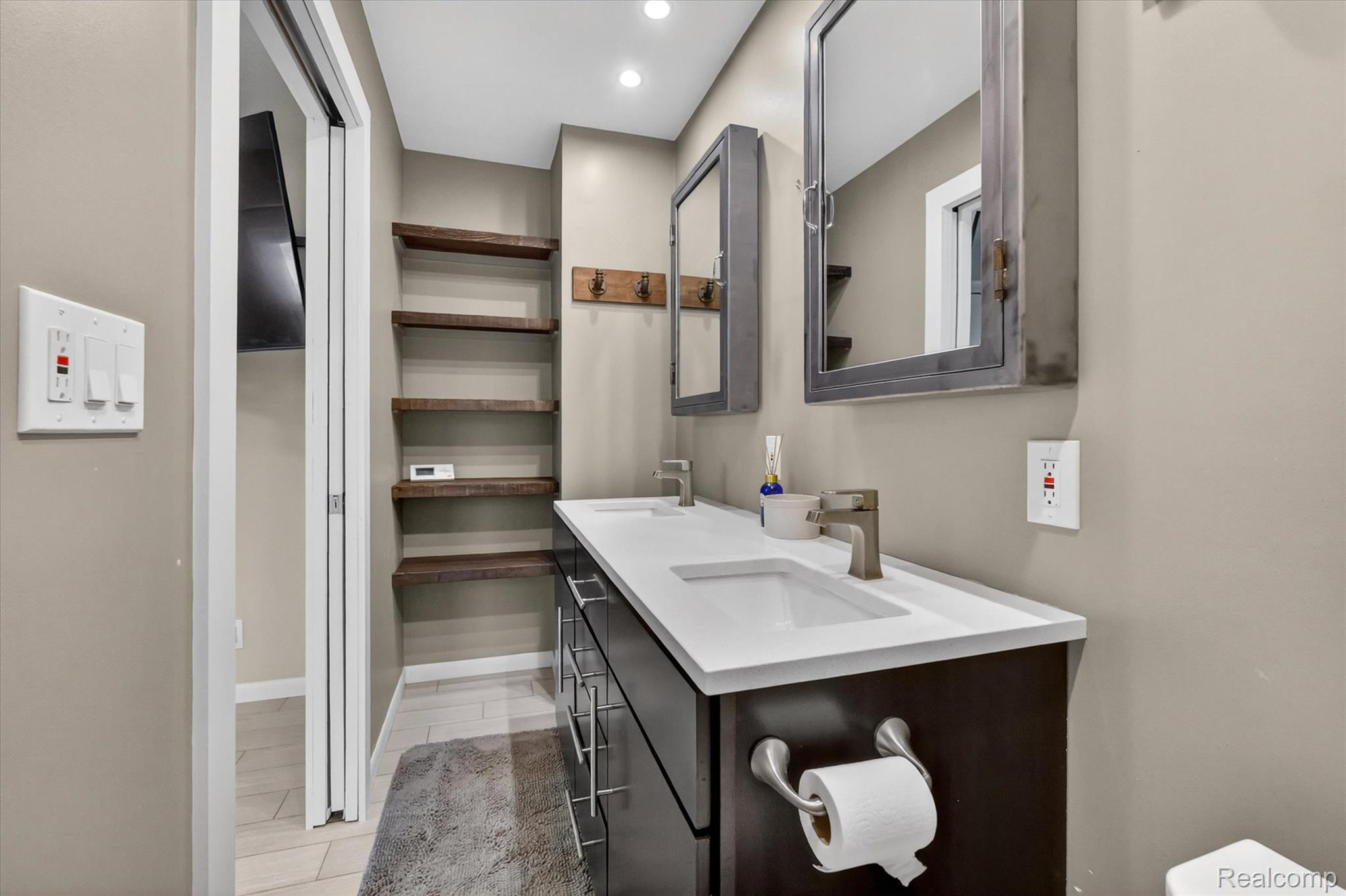 2264 Crane Road Fenton, MI 48430 - Photo 31 of 55 Full bath with double vanity and recessed lighting