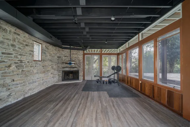 a view of a house with a patio and a garage