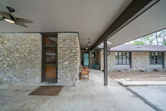 a view of a balcony with wooden floor