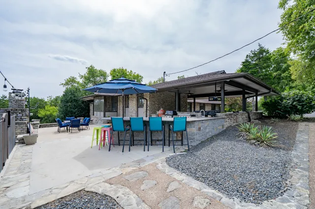 a house with a tree in front of it
