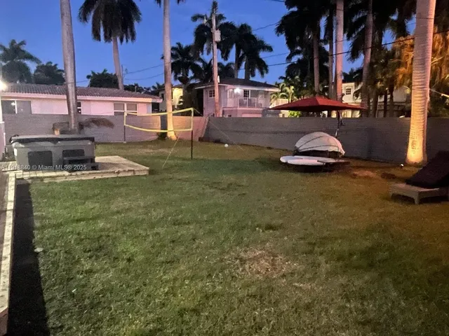 a view of a street with cars