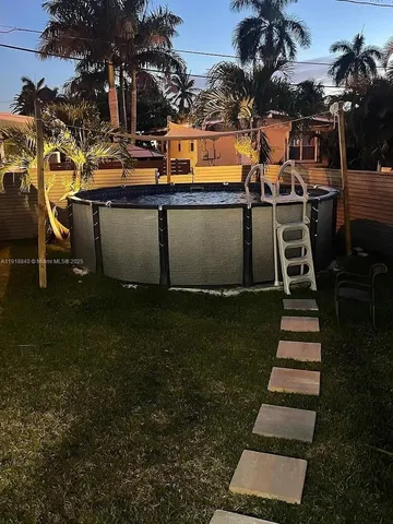 a view of outdoor space and yard