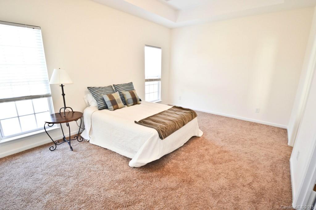 3740 Leela Palace Way Fort Mill, SC 29708 - Photo 8 of 11 a spacious bedroom with a bed and a window