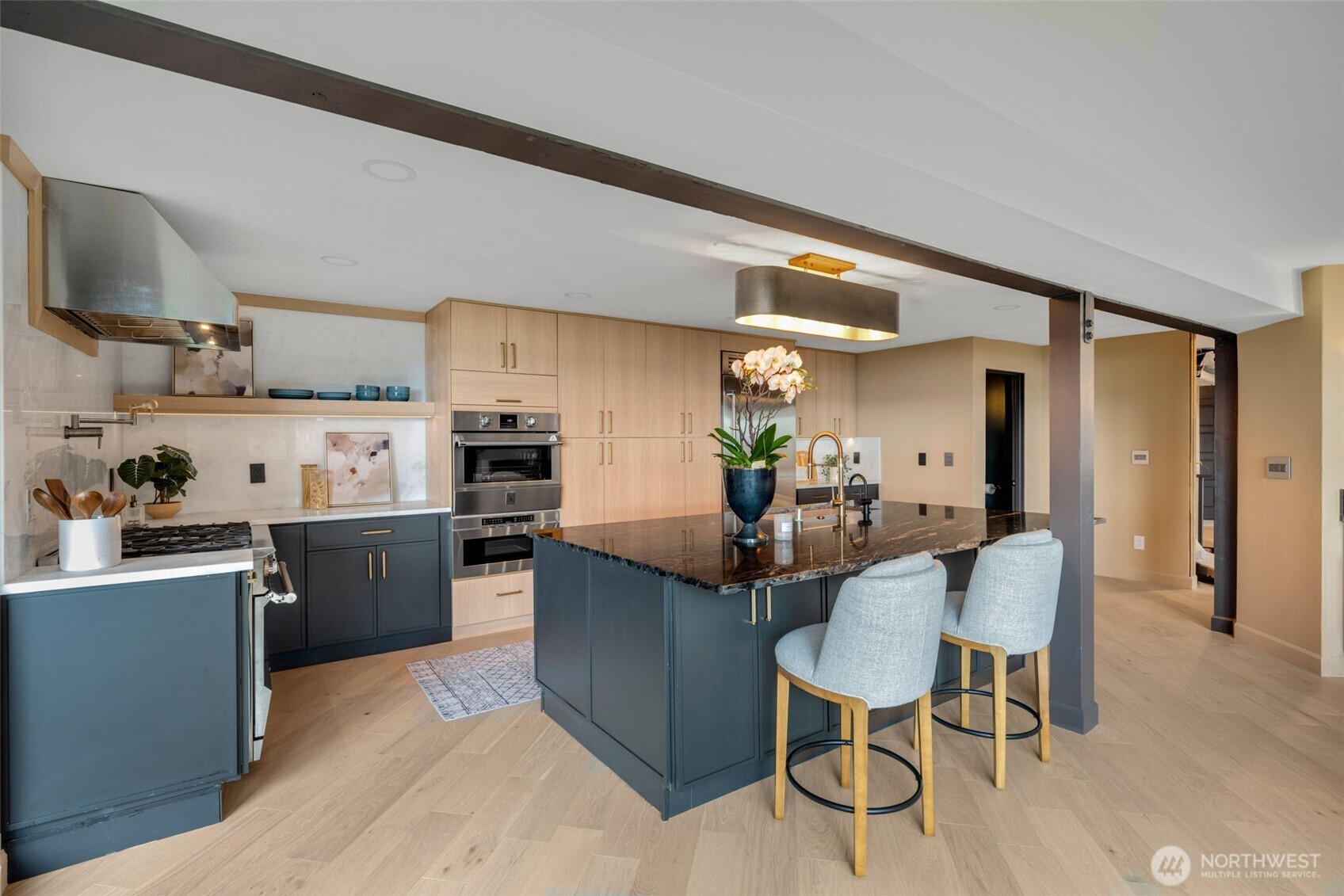 2650 Southwest 151st Place Burien, WA 98166 - Photo 11 of 40 a kitchen with granite countertop stainless steel appliances a sink and counter space