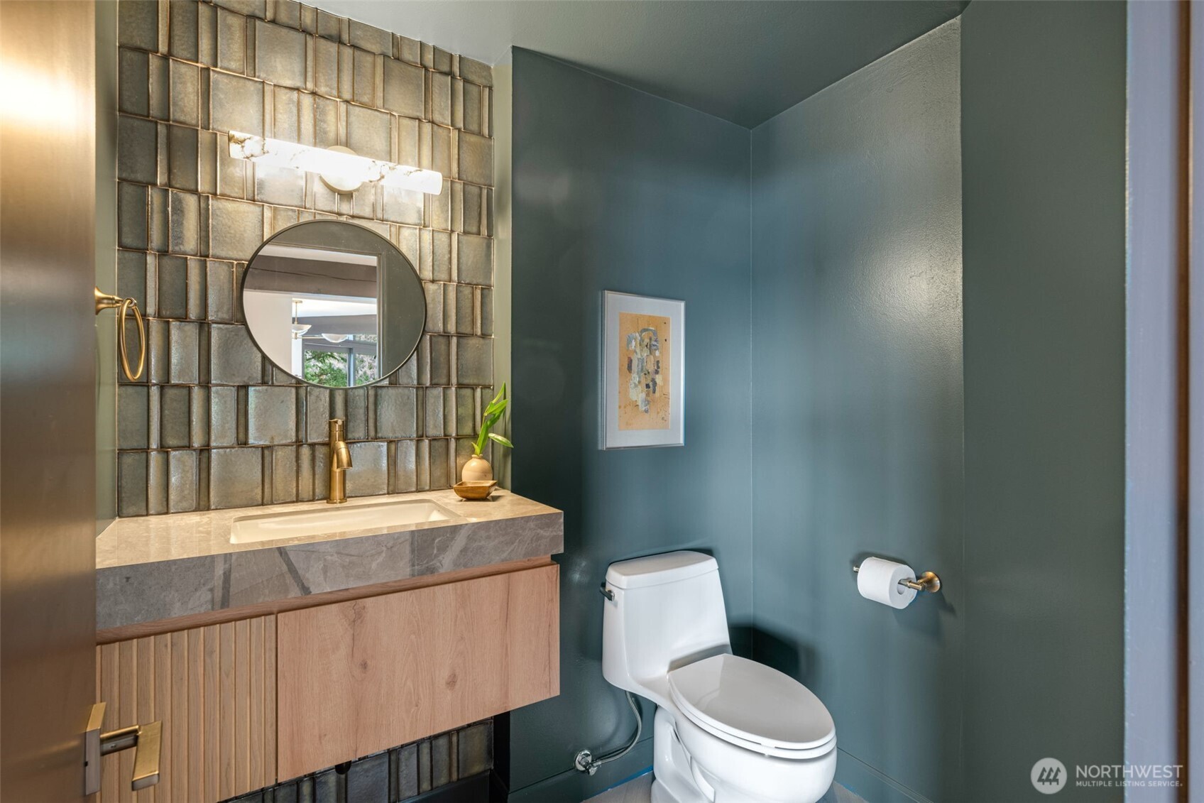 2650 Southwest 151st Place Burien, WA 98166 - Photo 16 of 40 a bathroom with a sink a toilet and shower