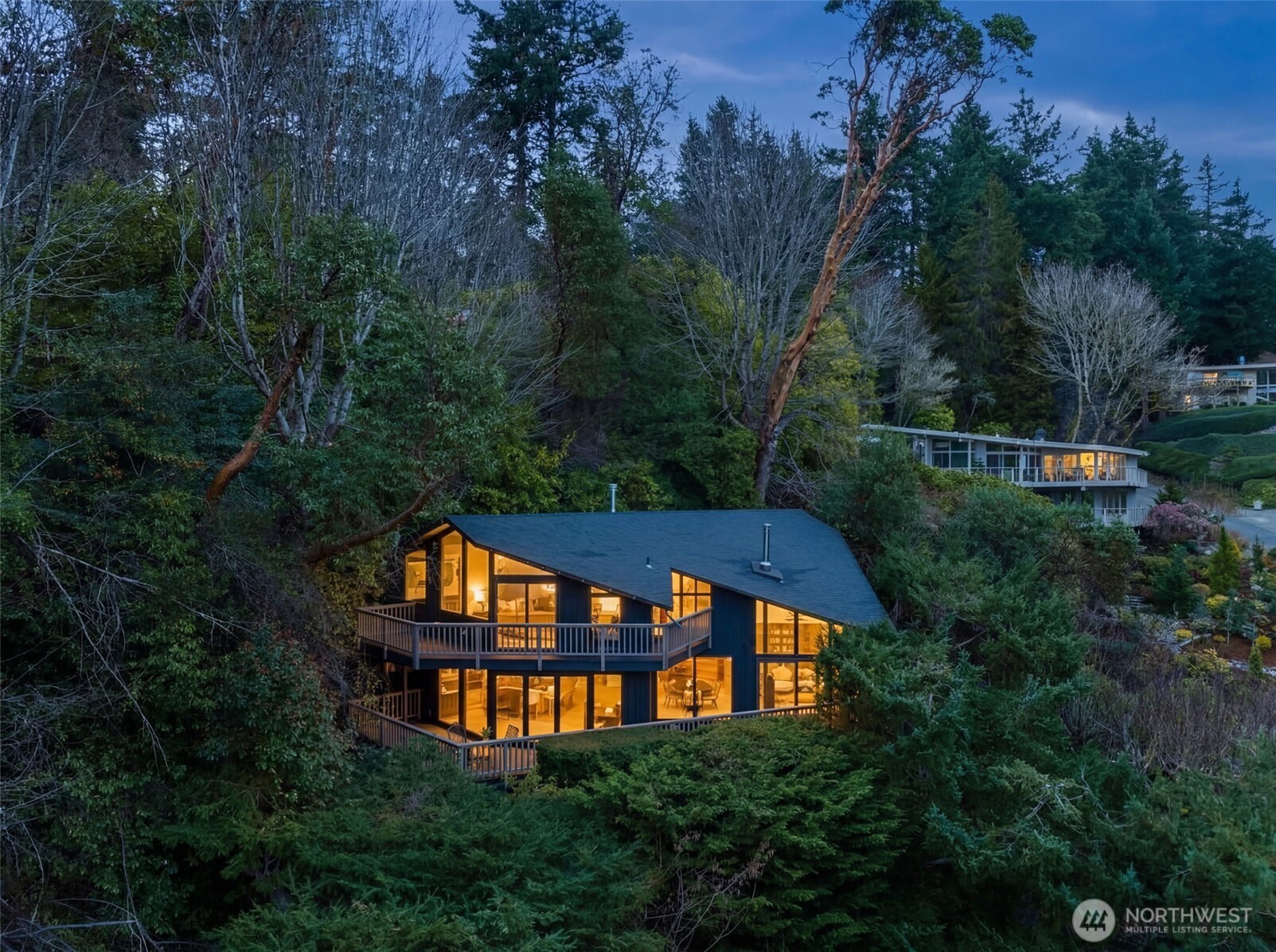 2650 Southwest 151st Place Burien, WA 98166 - Photo 2 of 40 an aerial view of a house roof deck and trees