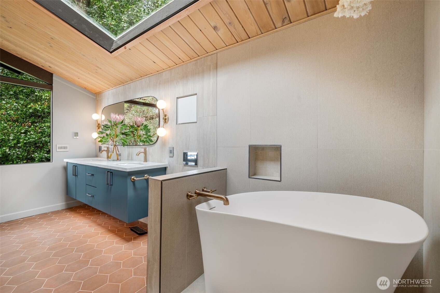 2650 Southwest 151st Place Burien, WA 98166 - Photo 25 of 40 a bathroom with a sink and a mirror