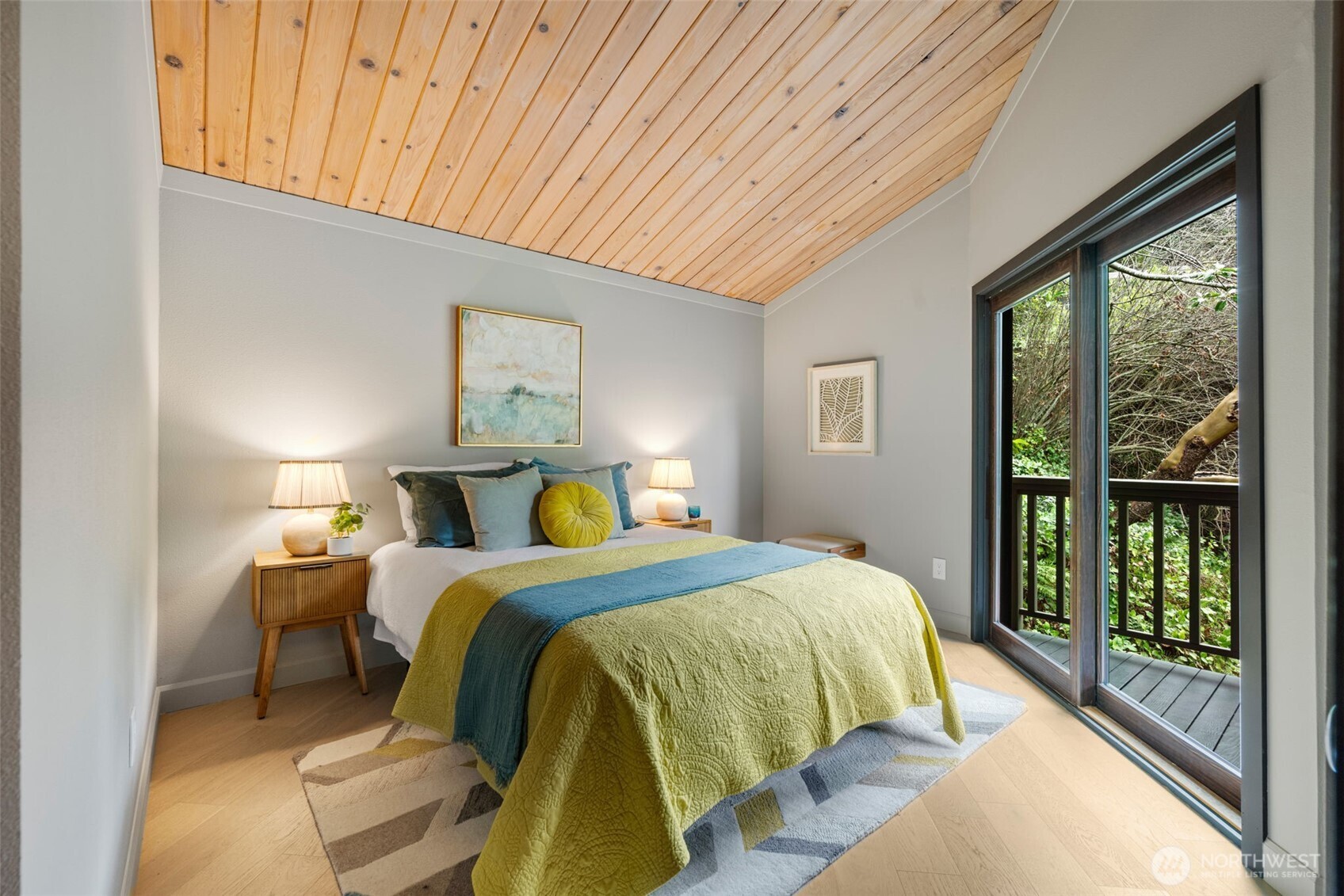 2650 Southwest 151st Place Burien, WA 98166 - Photo 27 of 40 a bedroom with a bed and a large window