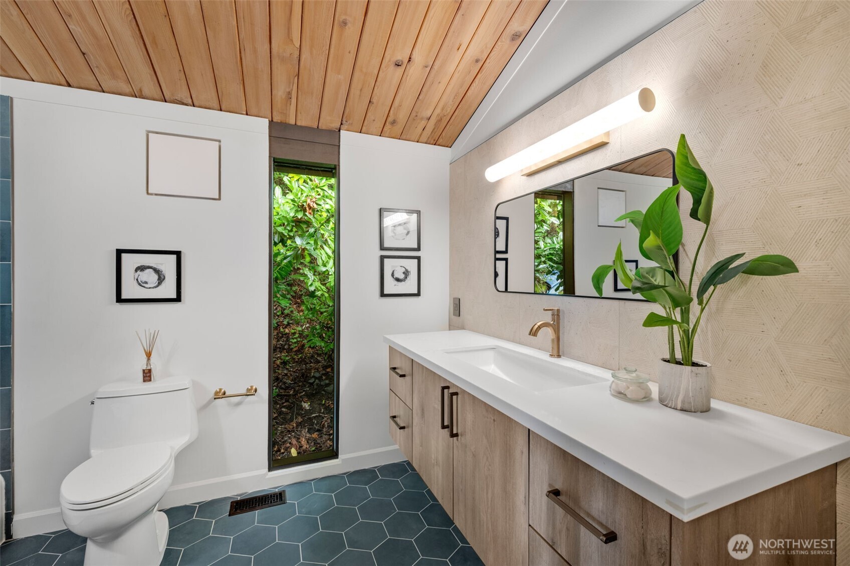 2650 Southwest 151st Place Burien, WA 98166 - Photo 28 of 40 a bathroom with a sink and a mirror