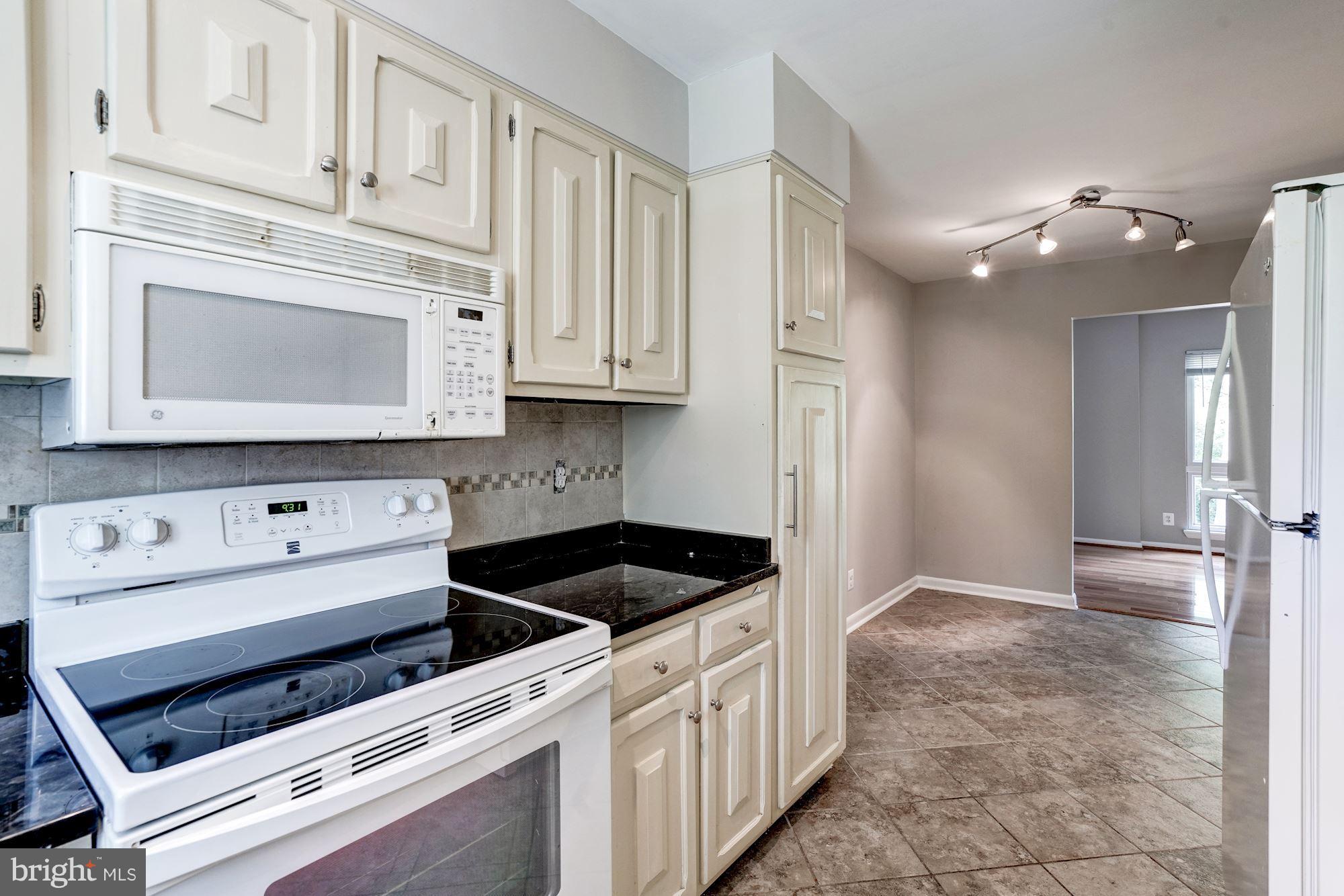 11049 Saffold Way Reston, VA 20190 - Photo 12 of 30 Toward the Dining Room