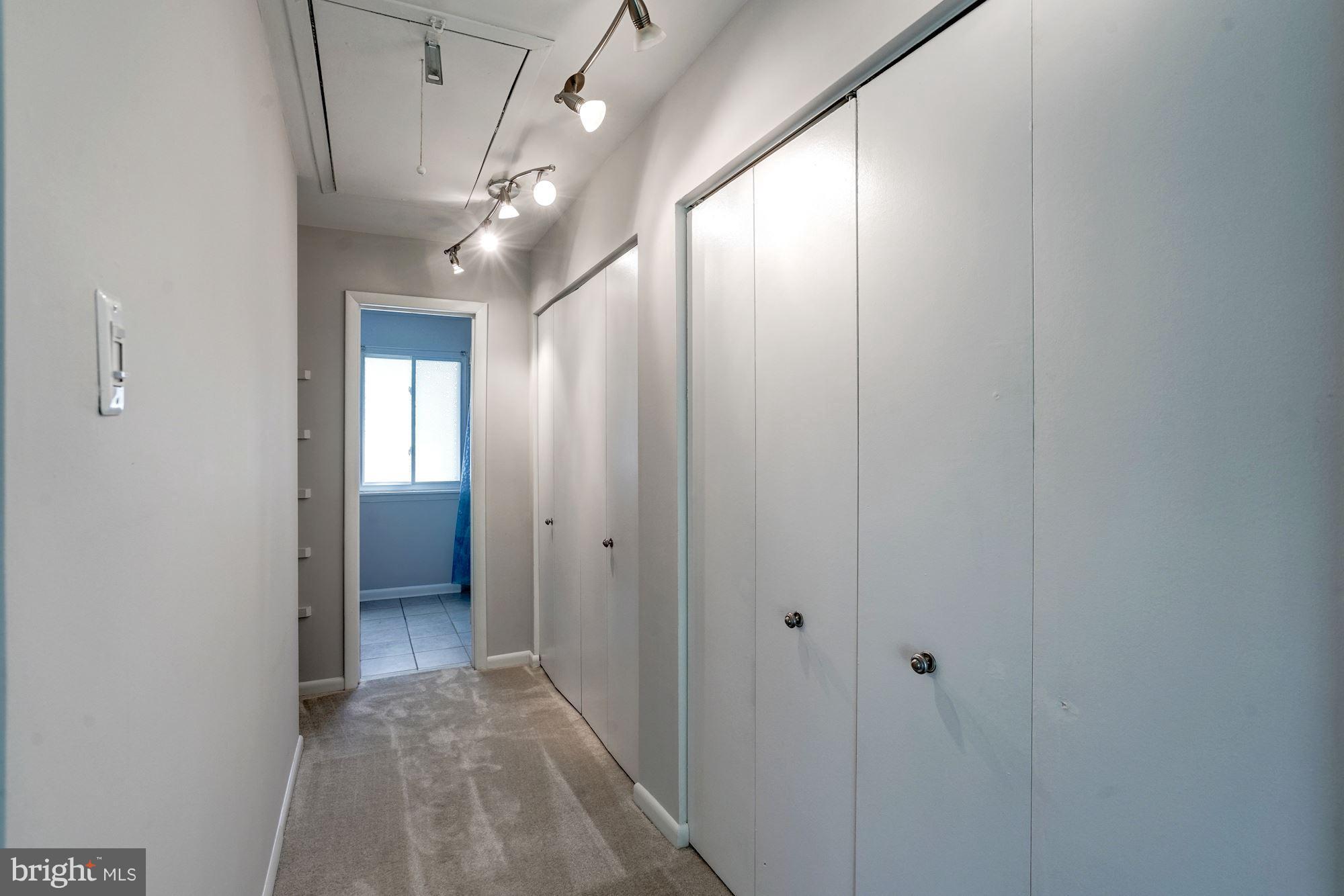 11049 Saffold Way Reston, VA 20190 - Photo 15 of 30 Notice the Closets and Pull Down Attic Stairs