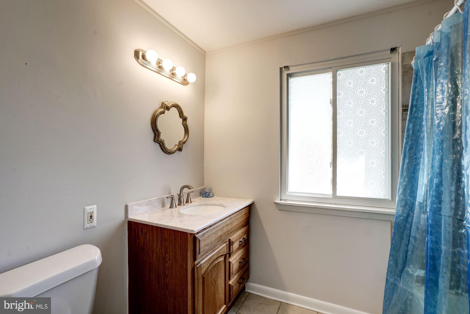 11049 Saffold Way Reston, VA 20190 - Photo 16 of 30 Newer Fixtures and Tile