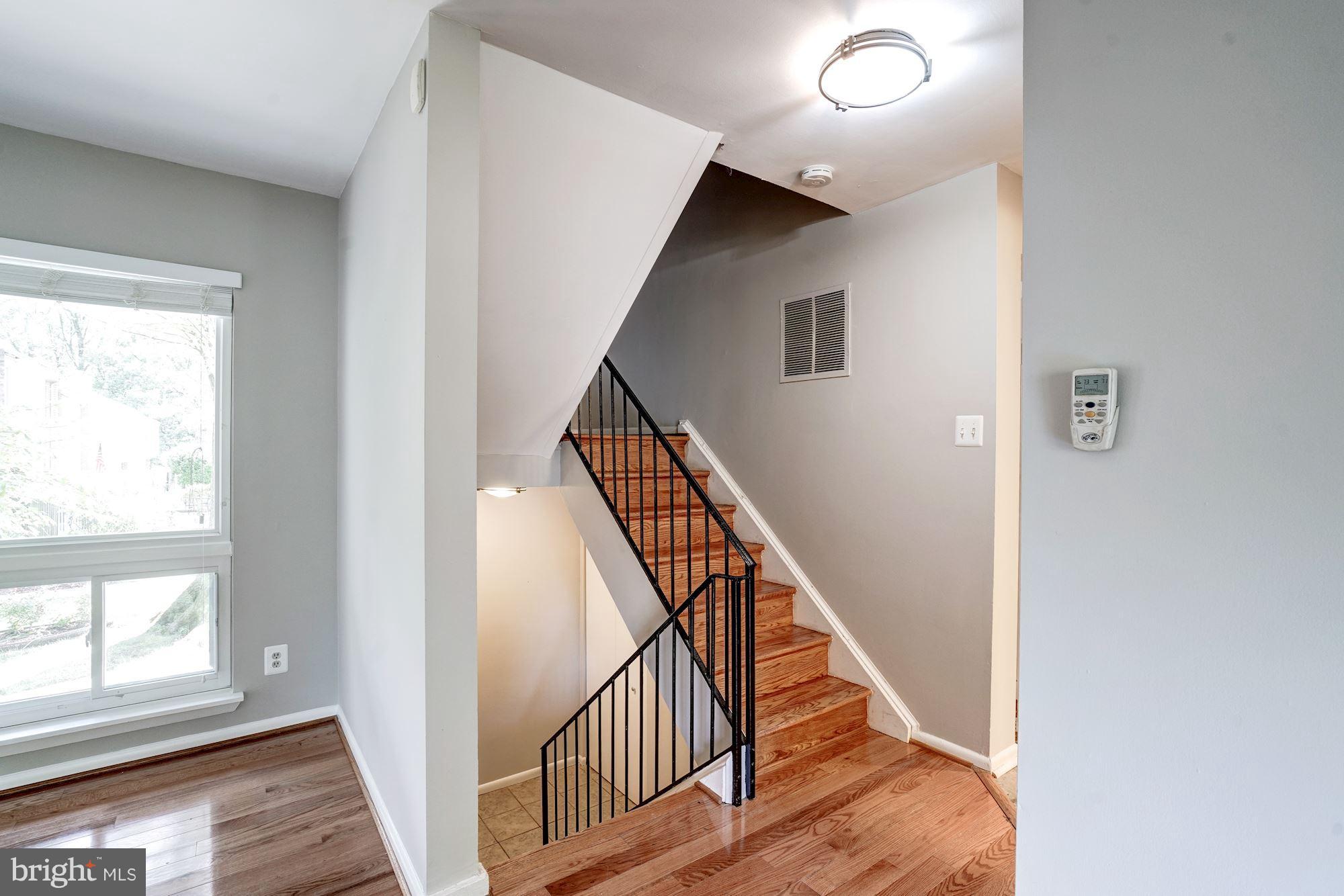 11049 Saffold Way Reston, VA 20190 - Photo 8 of 30 Beautiful Hardwood Stairs
