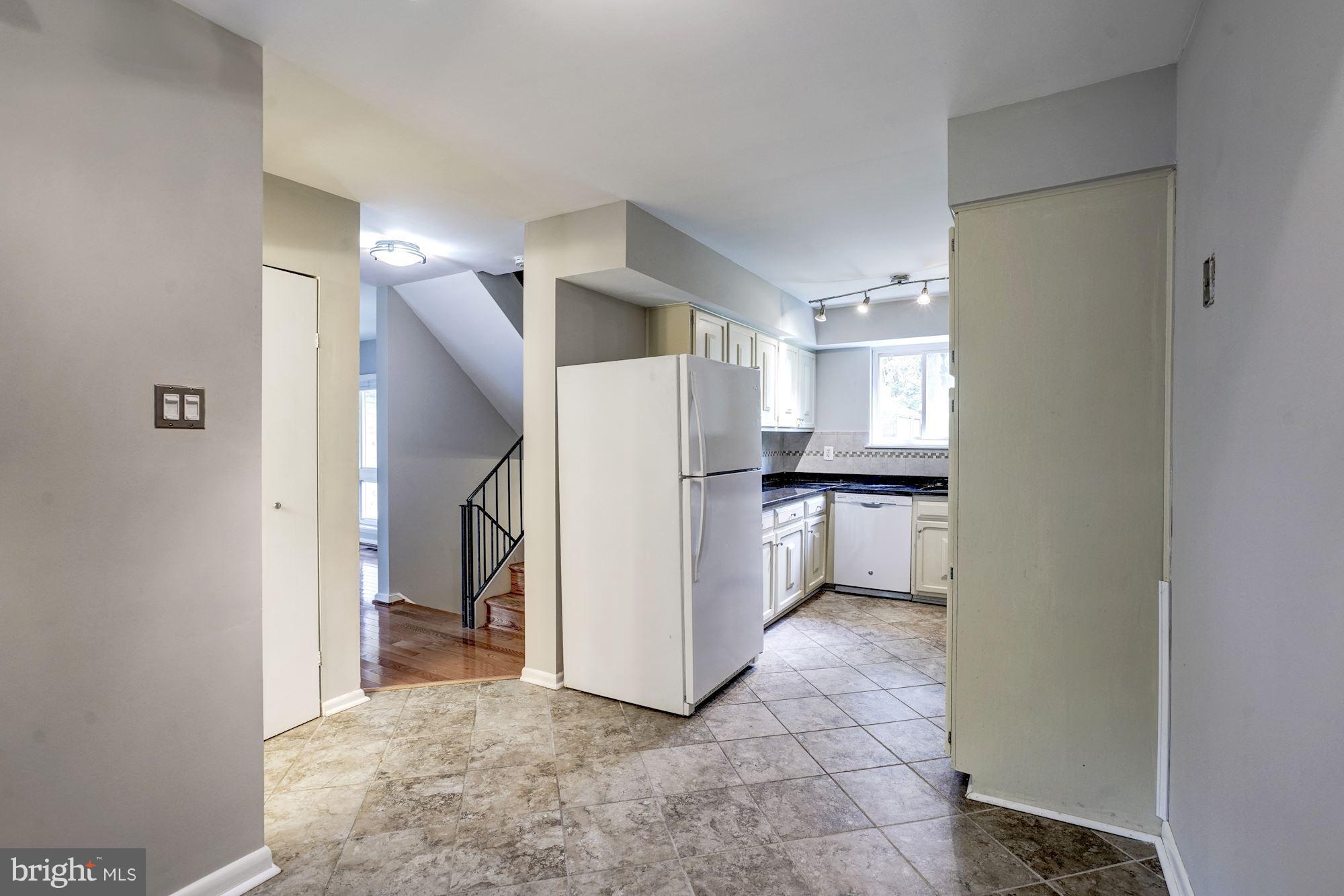 11049 Saffold Way Reston, VA 20190 - Photo 10 of 30 A look into the Kitchen from the Breakfast Room