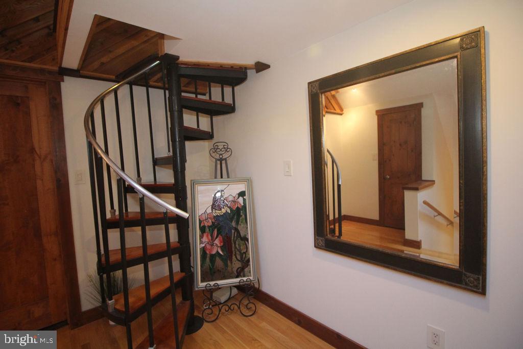 792 Knight Island Road Earleville, MD 21919 - Photo 58 of 75 spiral stairs to access 3rd floor room