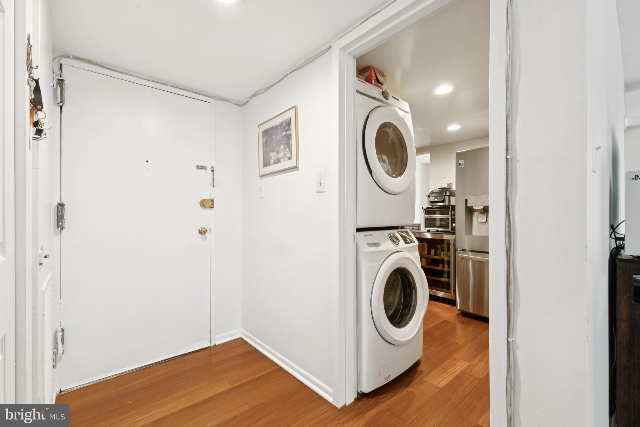 1413 Northgate Square, Unit 13/12B Reston, VA 20190 - Photo 13 of 25 a utility room with dryer and washer