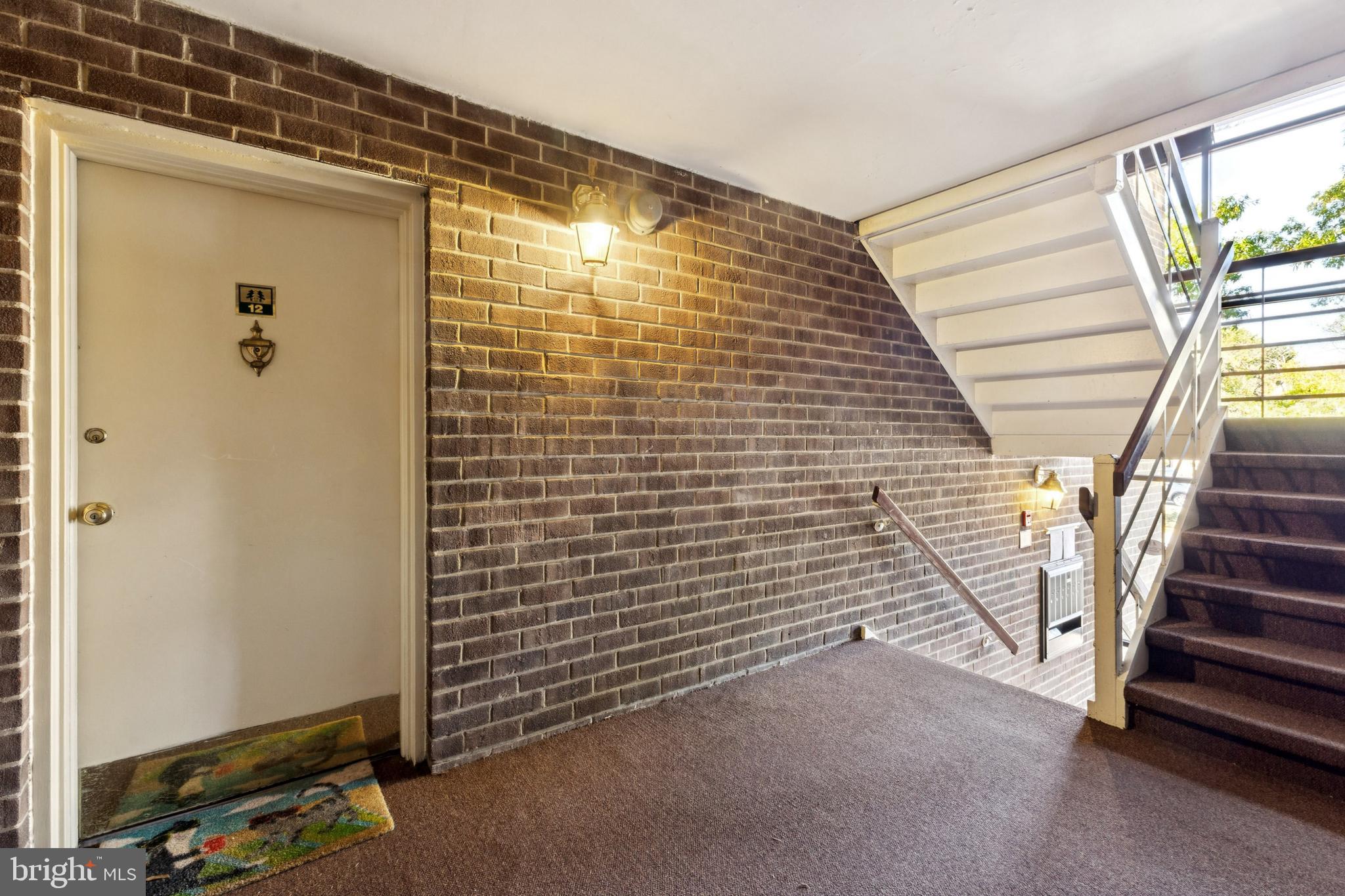 1413 Northgate Square, Unit 13/12B Reston, VA 20190 - Photo 2 of 25 a view of a door and an empty space