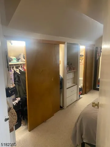 a en suite bathroom with a sink and a mirror