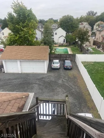 an aerial view of a house having yard