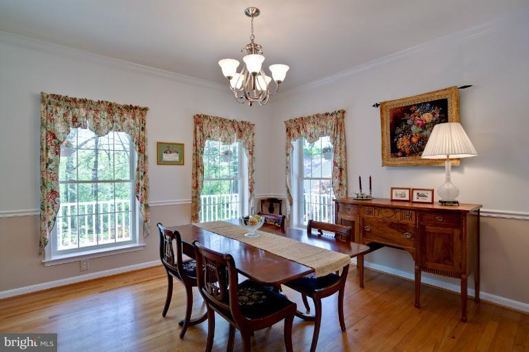 13415 Fork Road Baldwin, MD 21013 - Photo 1 of 29 a view of a dining room with furniture window and wooden floor