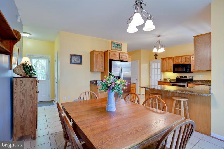 13415 Fork Road Baldwin, MD 21013 - Photo 13 of 29 a view of a dining room with furniture