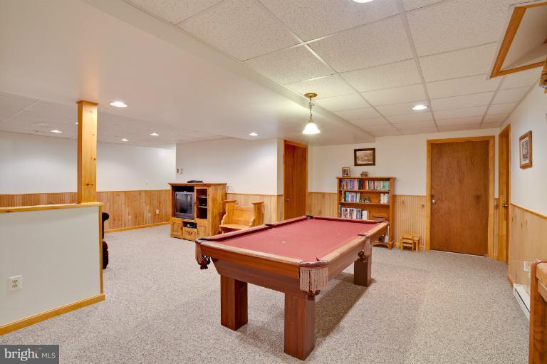 13415 Fork Road Baldwin, MD 21013 - Photo 3 of 29 a room with table and chairs
