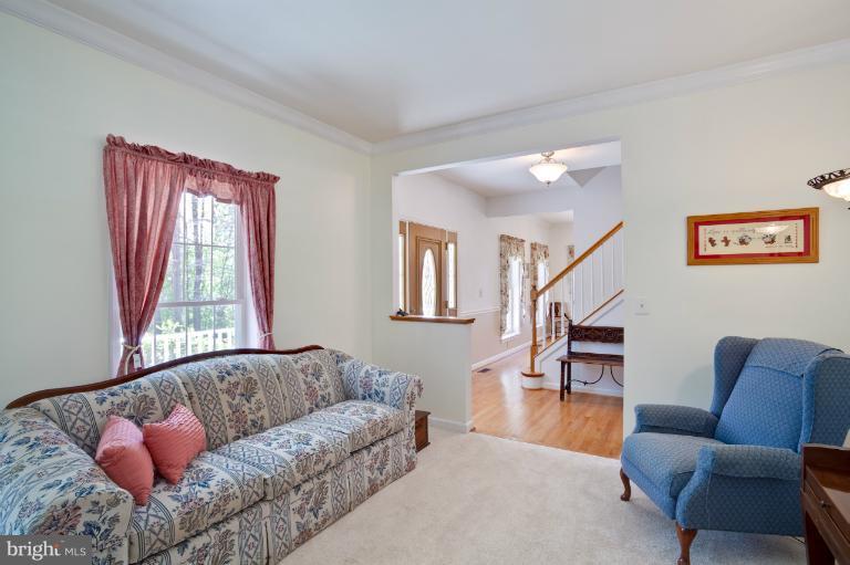 13415 Fork Road Baldwin, MD 21013 - Photo 22 of 29 a living room with furniture and a window