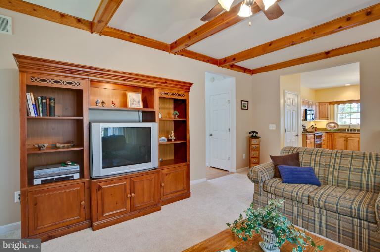 13415 Fork Road Baldwin, MD 21013 - Photo 25 of 29 a living room with furniture and a flat screen tv