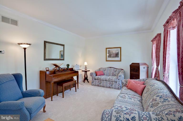 13415 Fork Road Baldwin, MD 21013 - Photo 4 of 29 a living room with furniture a lamp and a window