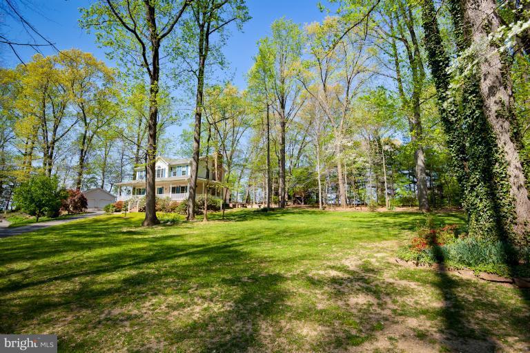 13415 Fork Road Baldwin, MD 21013 - Photo 10 of 29 a big yard with lots of green space and trees