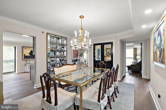 a view of a dining room with furniture and window