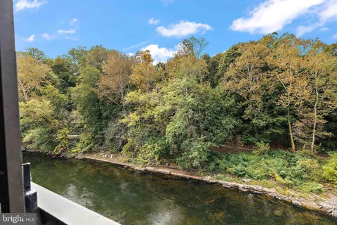 a view of a lake from a balcony