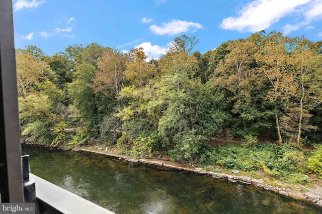 a view of a lake from a balcony