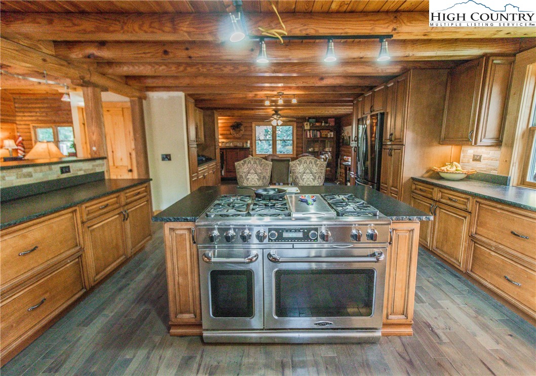3654 Andy Hicks Road Banner Elk, NC 28604 - Photo 27 of 40 a kitchen with a stove and a sink