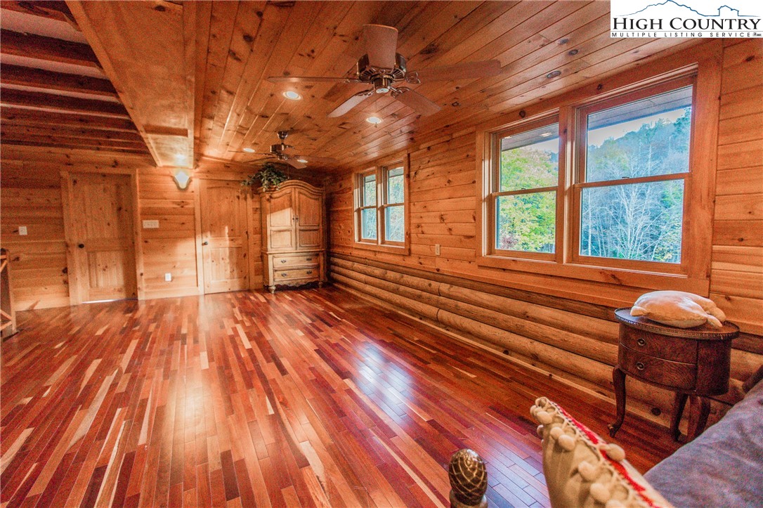3654 Andy Hicks Road Banner Elk, NC 28604 - Photo 40 of 40 a view of a room with wooden floor and windows