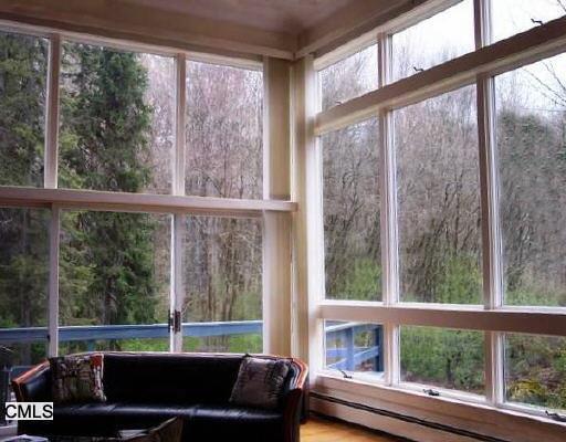 68 Topstone Road Redding, CT 06896 - Photo 1 of 1 a view of a room with balcony and furniture