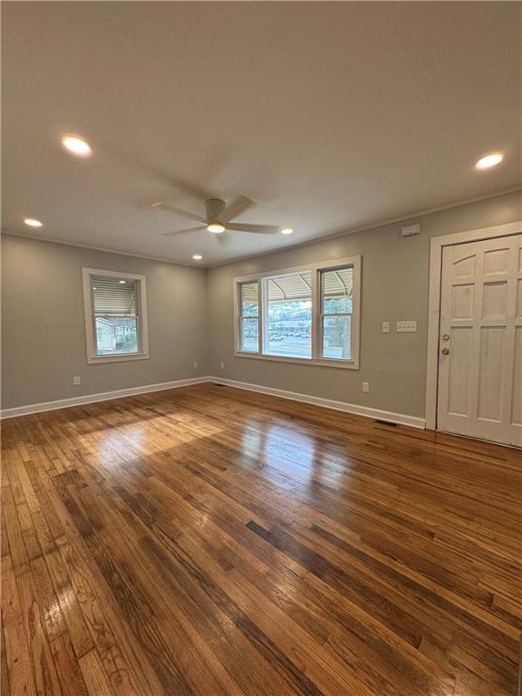 649 Valley Brook Road Scottdale, GA 30079 - Photo 6 of 18 a view of empty room with wooden floor and fan