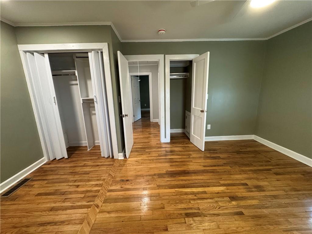 649 Valley Brook Road Scottdale, GA 30079 - Photo 9 of 18 a view of a room with wooden floor and a bathroom
