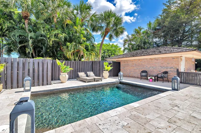 a view of backyard with a patio