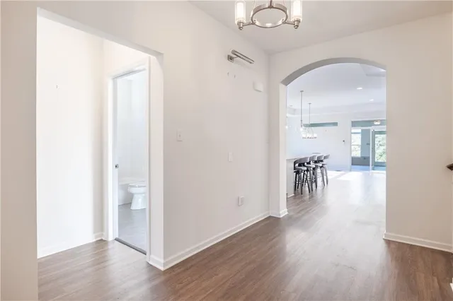 a view of a livingroom with wooden floor