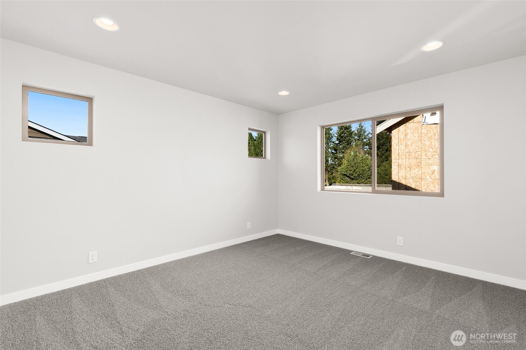 12510 Southeast 256th Place, Unit 7 Kent, WA 98030 - Photo 20 of 39 an empty room with a window